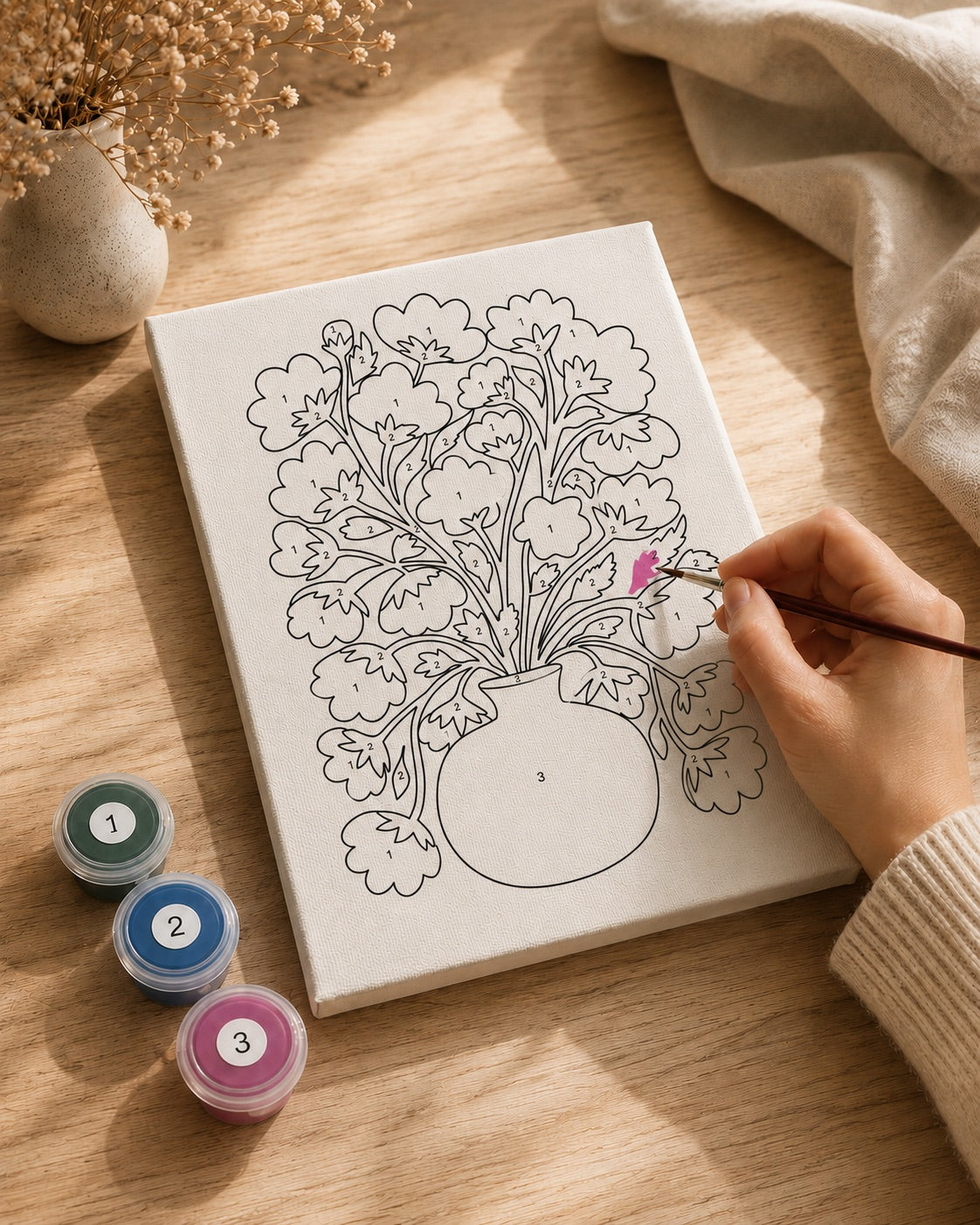 EasyArt.ae paint-by-number kit styled as a calm painting moment at home